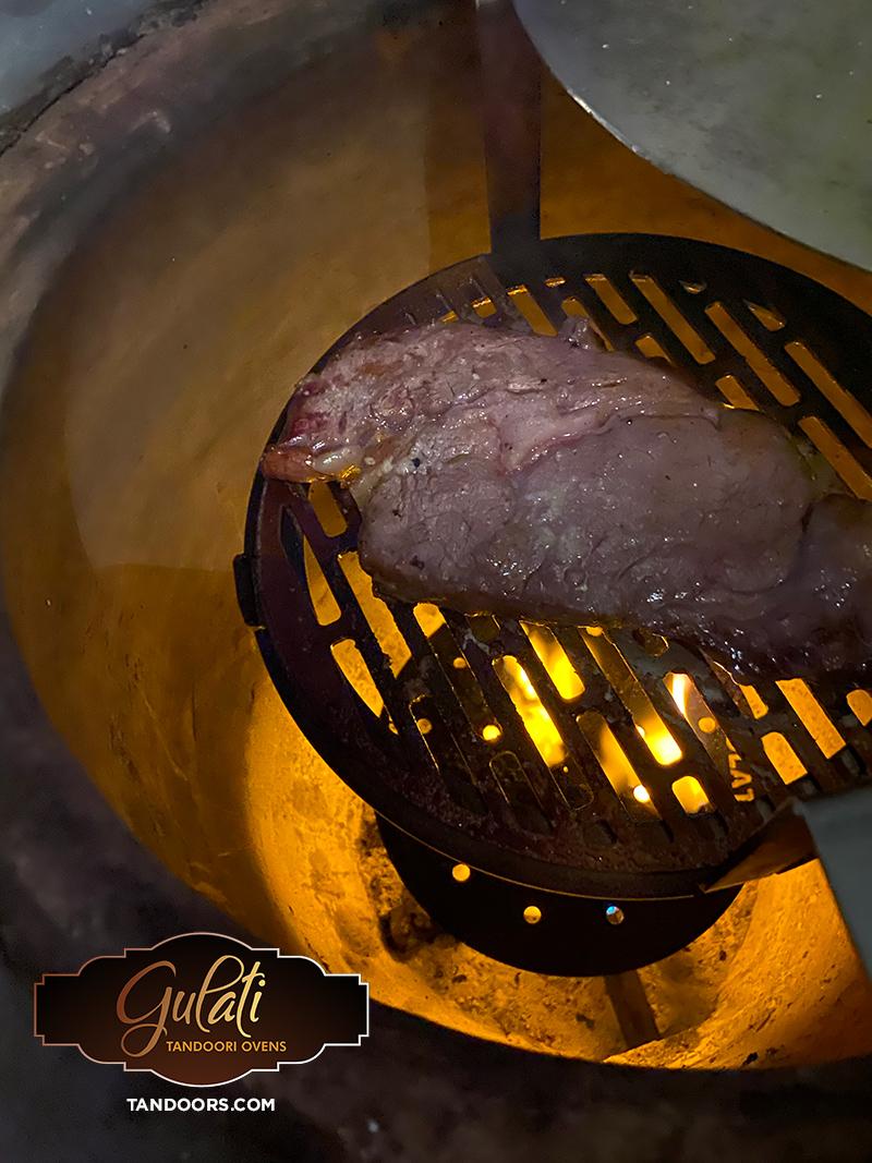 Gulati_TandoorDISC_InTandoor_SearingSteak_GrillGrate_1