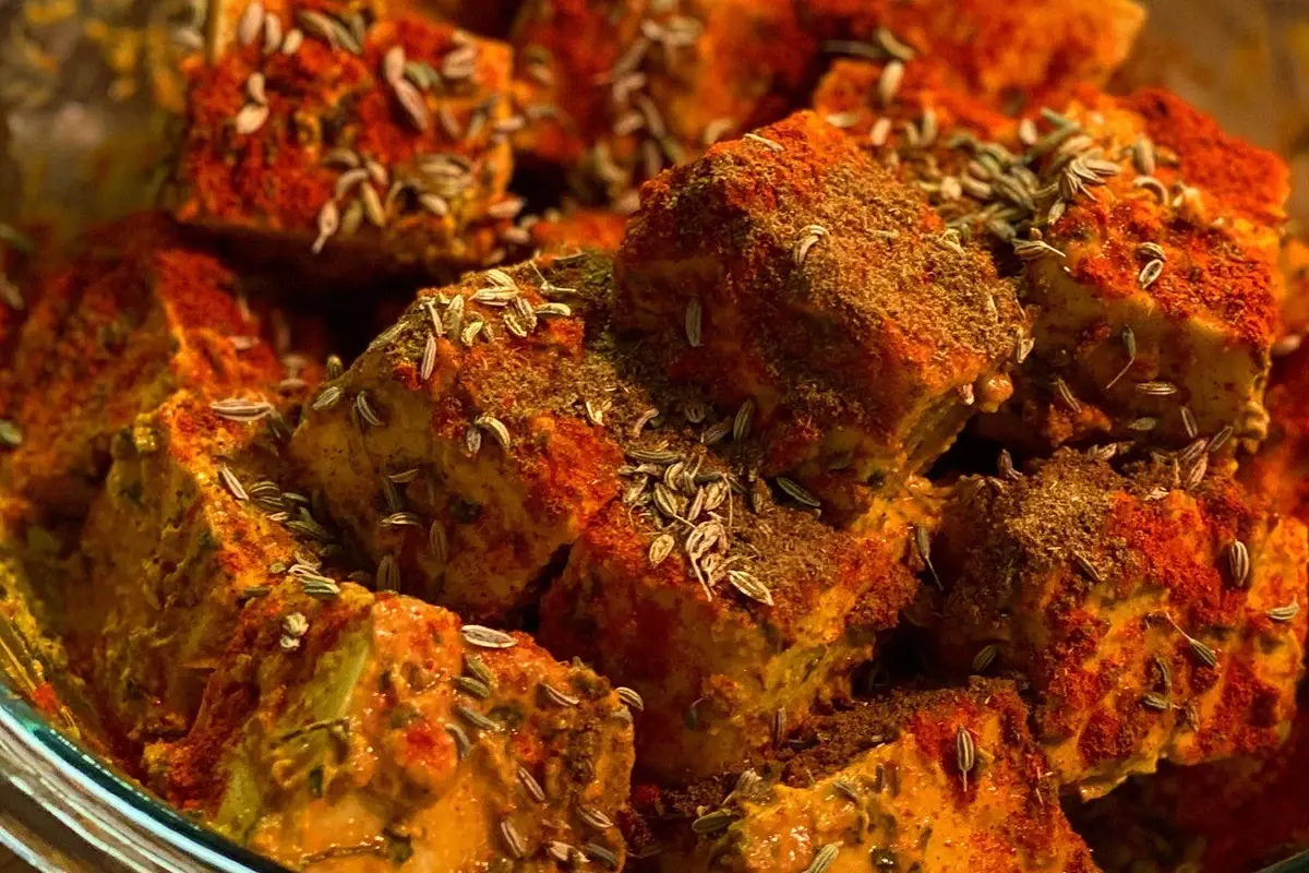Paneer tikka marinating in spices, ready for the tandoor