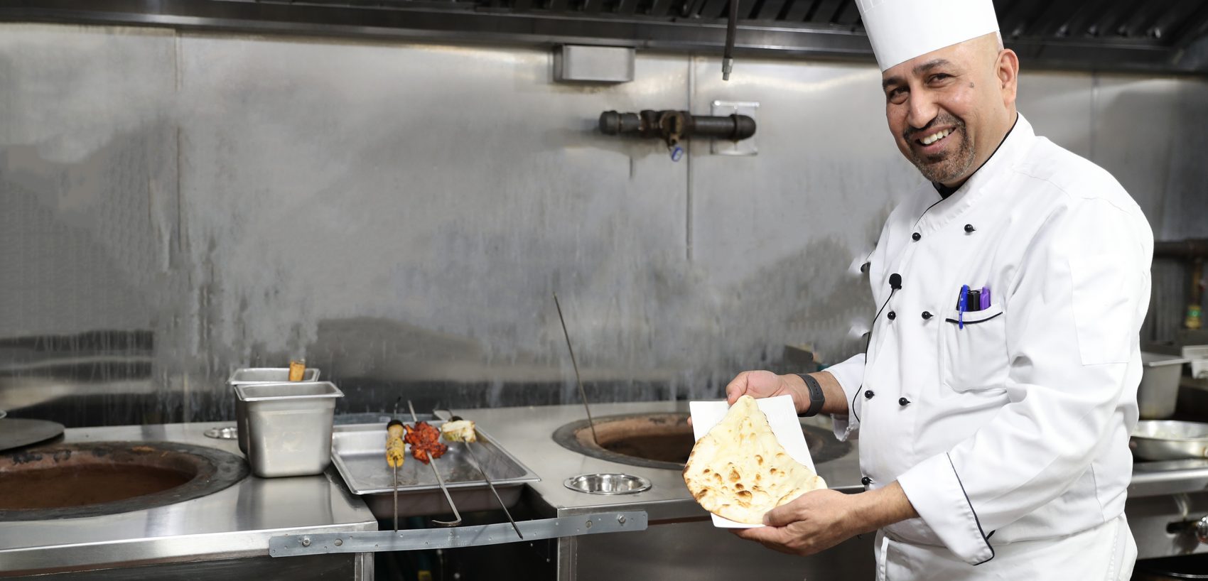 Michelin Starred Chef Raamanuj Sharma of Zaika New York making naan using GULATI Restaurant Tandoor