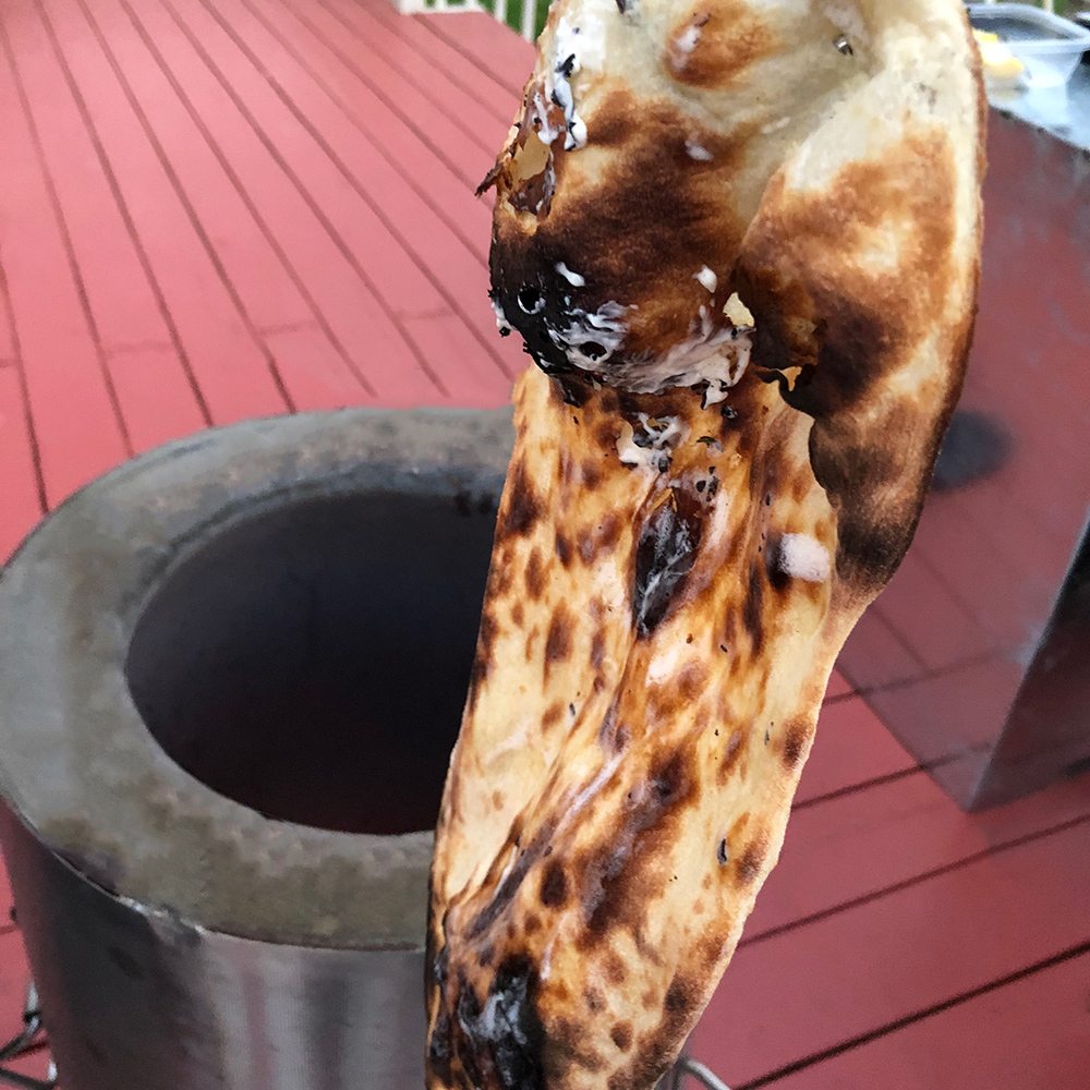 Fresh baked Naan cooked in a GULATI Home Tandoor